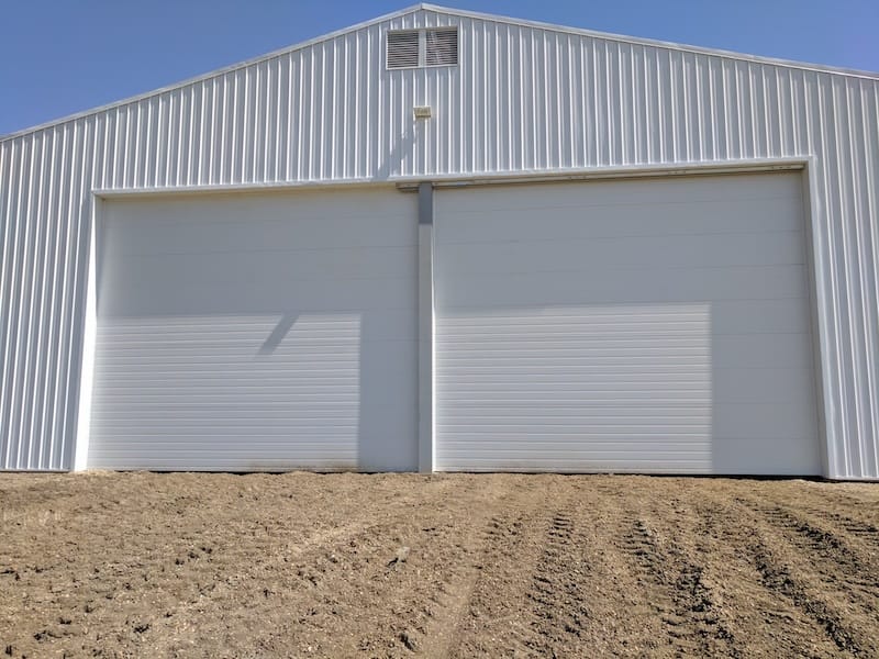 Two connected x-large opening shop doors
