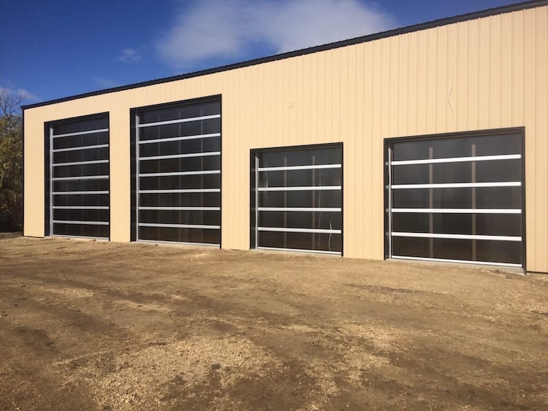Full glass overhead garage bay doors