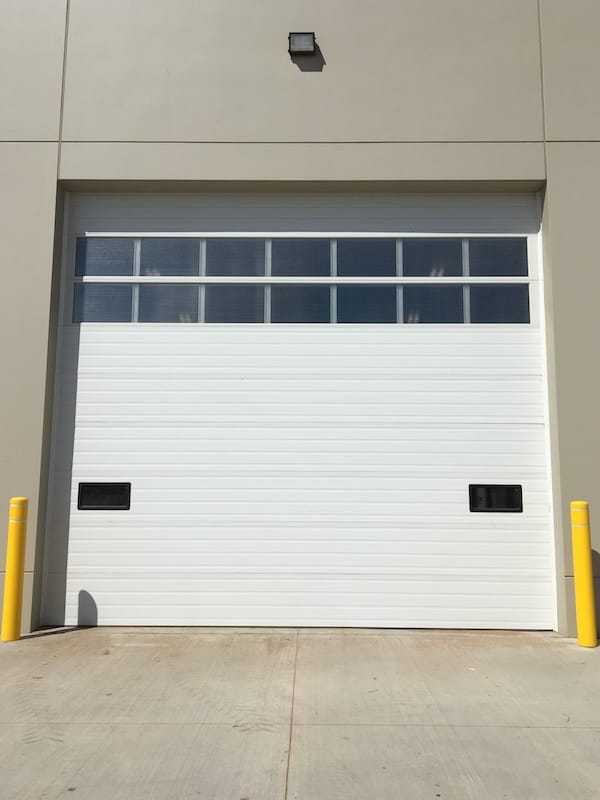 Tall overhead roll up door with multiple windows