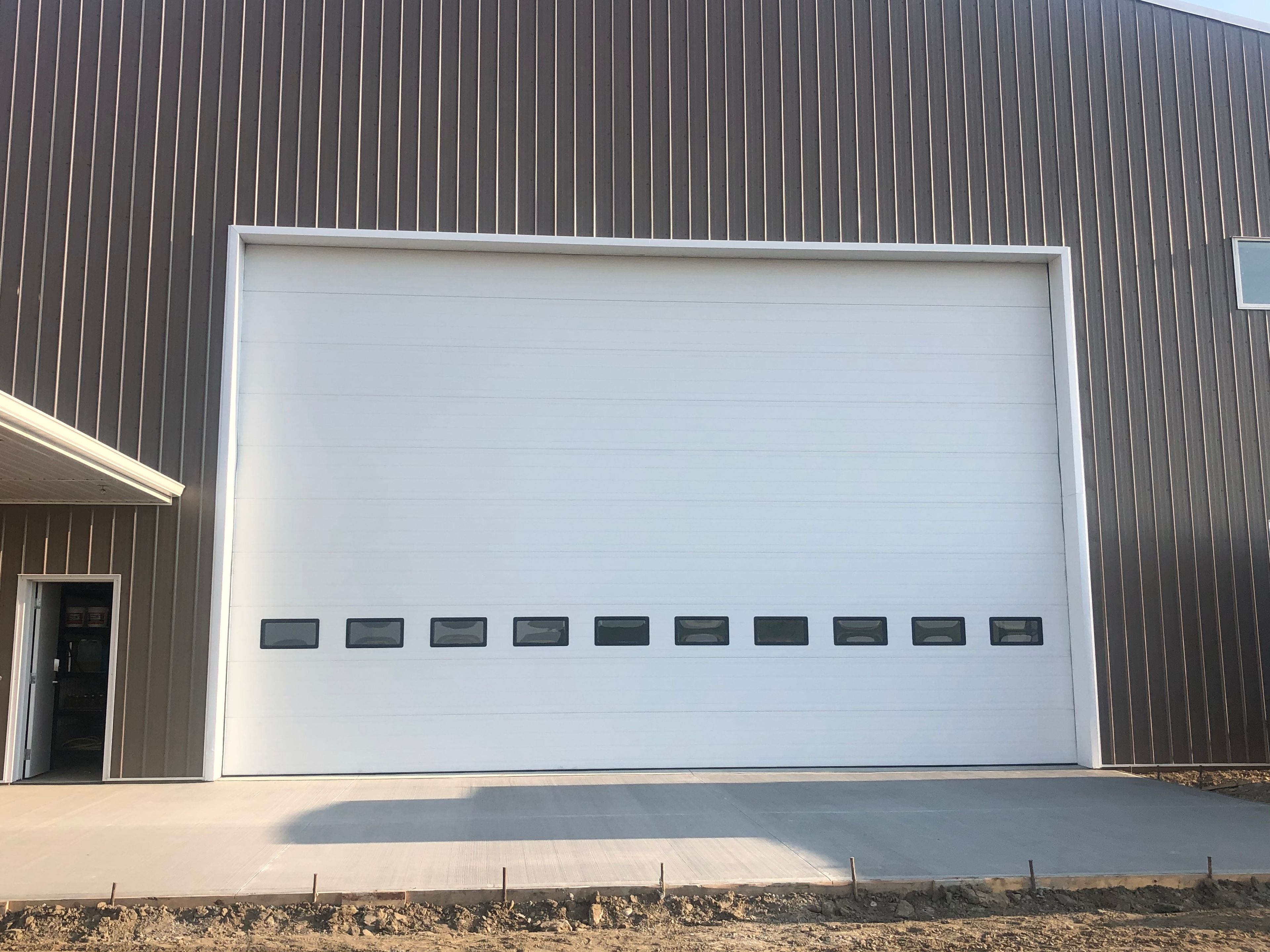 Wide shop bay door with windows