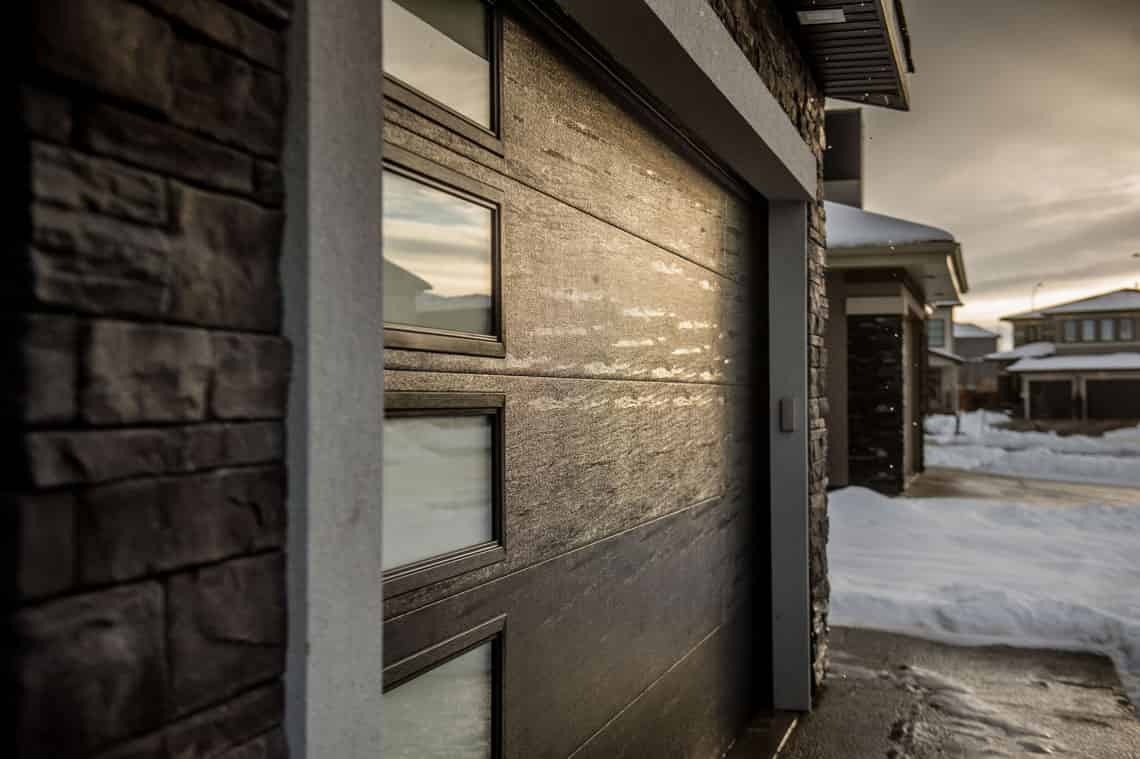 Residental garage door with glass windows